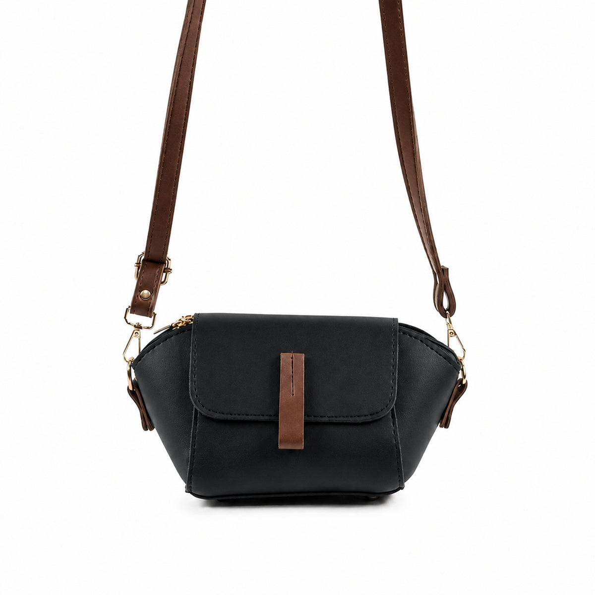 Saffiano flap crossbody bag in black - product front view on beige background with brown strap