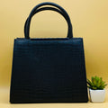 Black croco tote bag - side view close-up