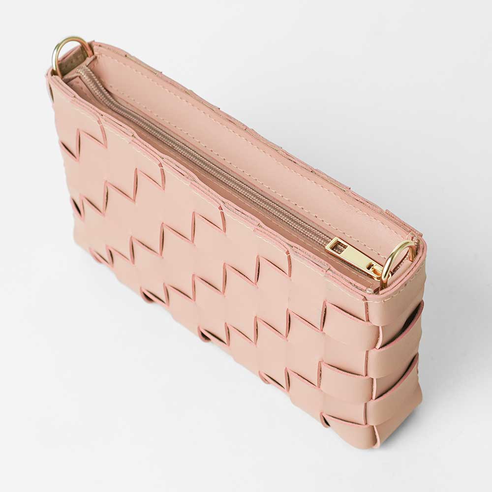 Woven leather crossbody clutch in blush pink - top open view showing gold zip closure detail