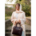 Maroon structured top handle handbag - back product view on white background