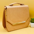 Beige saffiano crossbody satchel bag - angle view with strap