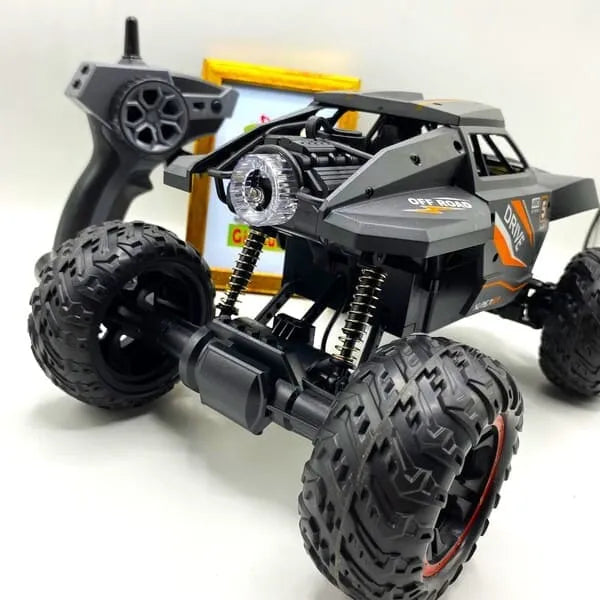4WD RC Climbing Monster Truck front view showing roll cage and off-road tires