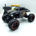 4WD RC Climbing Monster Truck front angle view showing suspension and tires