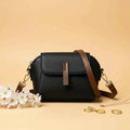 Cavelle crossbody purse in black - front view
