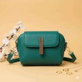 Cavelle crossbody purse in green - front view