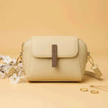 Cavelle crossbody purse in skin/beige - front view