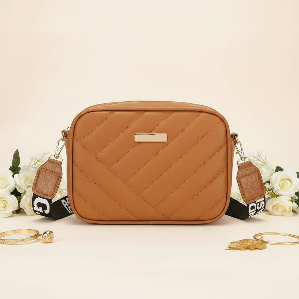 Elorina luxe crossbody bag - chevron quilted detail close-up