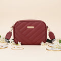 Elorina luxe crossbody bag - designer print strap detail