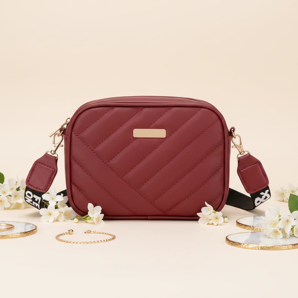 Elorina luxe crossbody bag - designer print strap detail