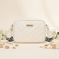 Elorina luxe crossbody bag - gold carabiner clip and hardware detail