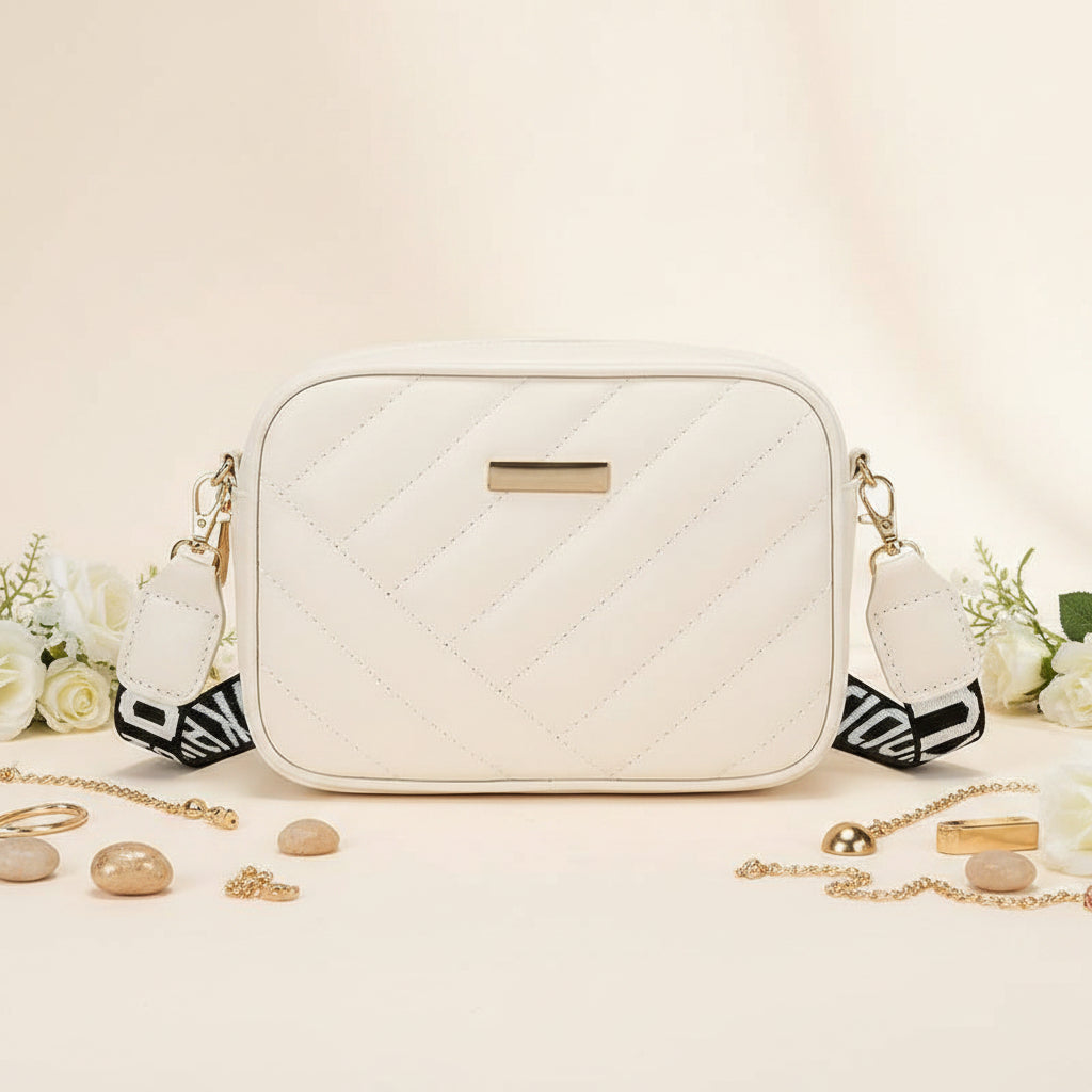 Elorina luxe crossbody bag - gold carabiner clip and hardware detail