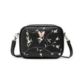 Embroidered butterfly crossbody bag in white - top angle view on white surface