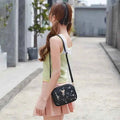 Embroidered butterfly crossbody bag in pink - front view angle 1