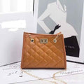 Laila mini chain satchel in camel - editorial side view on fashion magazine
