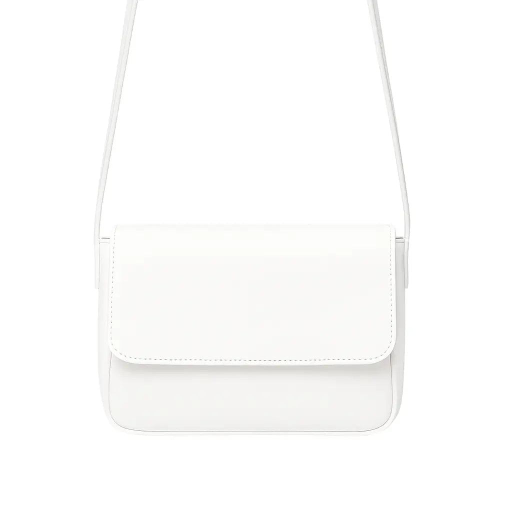 Magnetic crossbody bag in white - clean product front view on white background