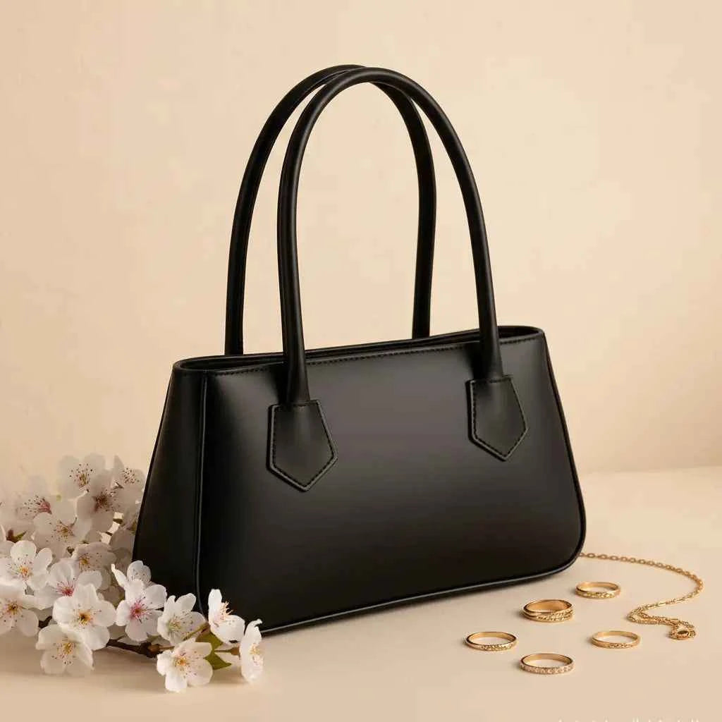 Mahveen elegant ladies handbag in black - side angle view with white flowers and gold rings