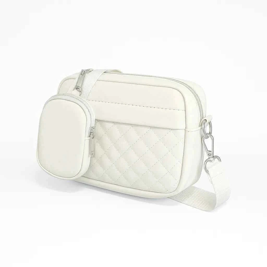 Quilted crossbody bag with coin pocket in white - side angle product view on white background