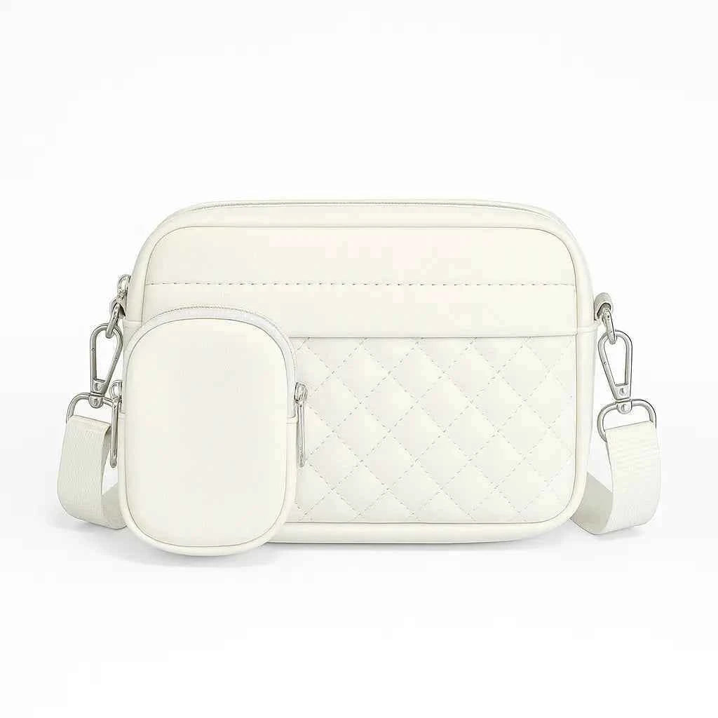Quilted crossbody bag with coin pocket in white - clean product front view on white background