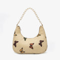 Rangon Ki Titli butterfly print pearl handle bag - clean product front view on white background