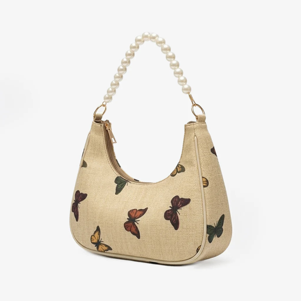 Rangon Ki Titli butterfly print pearl handle bag - product side angle view on white background