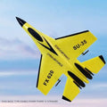 FX-620 SU-35 RC Fighter Jet yellow on table with cactus plants lifestyle shot